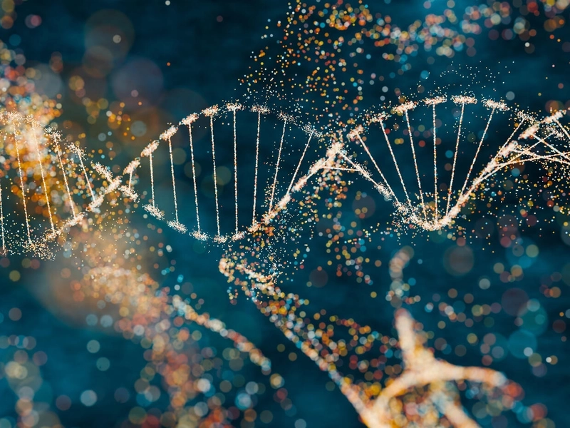 Abstrakcyjne przedstawienie struktur podwójnej helisy DNA otoczonej unoszącymi się cząstkami na niebieskim tle
